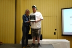 Jeanette Gilbreath awarding James Draine and H.J. Holtz & Sons with 2017 Craftsmanship Award